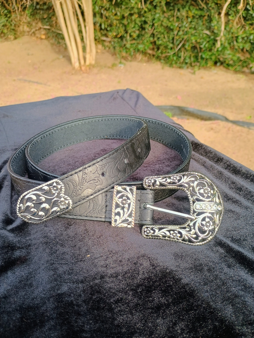 Black Embossed Leather Belt with Decorative Silver Buckle